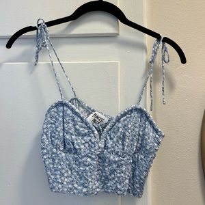 Princess Polly crop top. Light blue with white flowers. Tie straps size 0